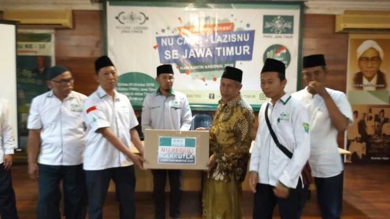 Peduli Kabut Asap, NU Care Sidoarjo Kirim Ribuan Masker