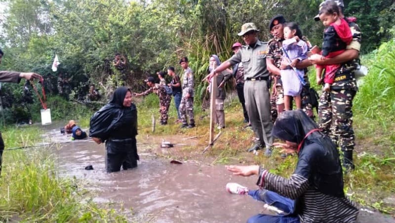 Sembari Menyusui Anak, Ibu Muda Ini Rela Ikuti Pelatihan Banser