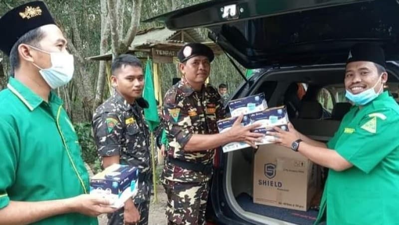 Kampanyekan Prokes, Ansor Way Kanan Bagikan Ratusan Masker