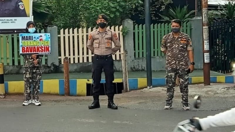 Ansor dan Banser Ternate Turun Jalan Ajak Masyarakat Ikut Vaksinasi