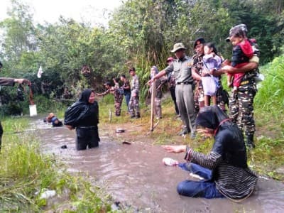 Sembari Menyusui Anak, Ibu Muda Ini Rela Ikuti Pelatihan Banser