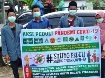 Giliran Berbagai Elemen NU di Melawi Kalbar Bagikan Sembako
