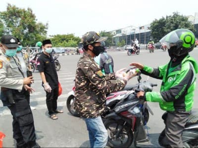 Bantu Terdampak Covid-19, Ansor Jakarta Utara Bagikan Makanan Gratis