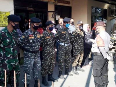 Polisi di Sidoarjo Libatkan Banser Gelar Operasi Protokol Kesehatan