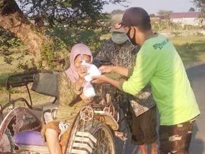 Jumat Berkah, Ansor Banser di Tegal Bagikan Ratusan Nasi Bungkus Gratis