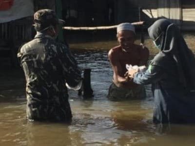 Relawan NU Terjang Banjir Salurkan Bantuan ke Kalsel 