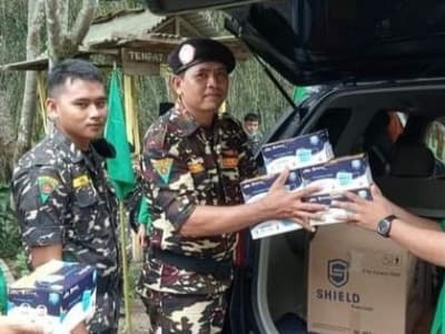 Kampanyekan Prokes, Ansor Way Kanan Bagikan Ratusan Masker