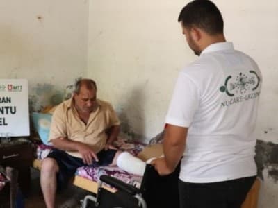 NU-Care LAZISNU distributes wheelchairs and crutches for Palestinian