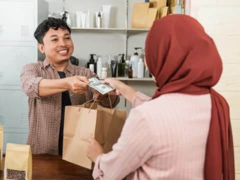 Halalkah Uang Hasil Jual Beli dengan Non-Muslim?
