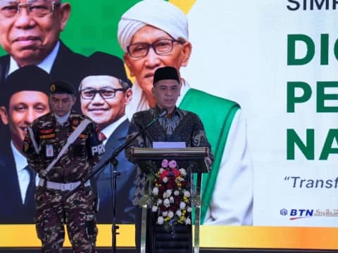 Hadiri Simposium Nasional, Wamenag Harap PTNU Punya Pola Pikir Digital 