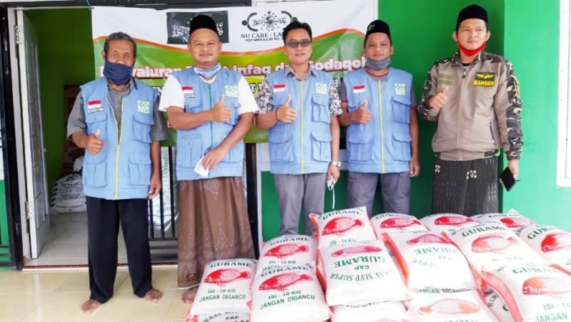 NU Care-LAZISNU di Lamteng Salurkan 1 Ton Beras untuk Warga Terdampak Covid-19