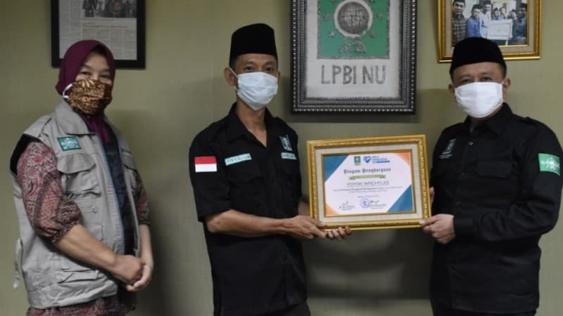 LPBINU Beri Penghargaan Relawan Covid-19
