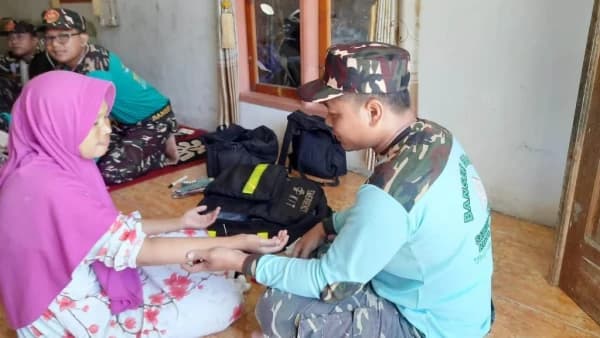 Banser Husada Berikan Terapi Gratis untuk Warga Terdampak Banjir Lahar Semeru